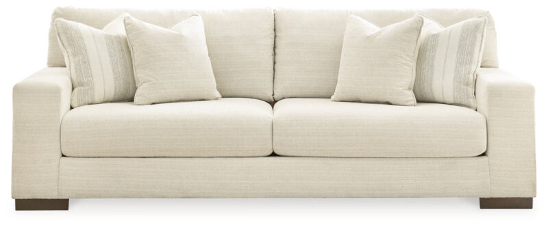 Classic comfort gets a mod twist with the Maggie sofa. Its minimalistic approach and structured silhouette bring a clean-lined design element to your living room. Sink into the positively plush cushions while relaxing solo, or curl up with a glass of wine while hosting guests. And with light neutral upholstery that suits both casual and contemporary spaces, this sofa offers endless style possibilities. Corner-blocked frame Reversible cushions High-resiliency foam cushions wrapped in thick poly fiber Accent pillows included Pillows with feather-fiber fill Polyester upholstery Exposed feet with faux wood finish Platform foundation system resists sagging 3x better than spring system after 20,000 testing cycles by providing more even support Smooth platform foundation maintains tight, wrinkle-free look without dips or sags that can occur over time with sinuous spring foundations Fabric Details Body and One Side Toss Pillows: Polyester (100)% Oneside Toss Pillows: Polyester (100)%