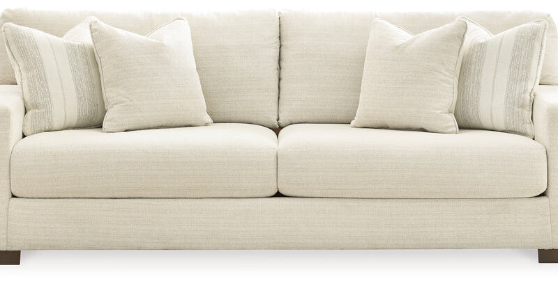 Classic comfort gets a mod twist with the Maggie sofa. Its minimalistic approach and structured silhouette bring a clean-lined design element to your living room. Sink into the positively plush cushions while relaxing solo, or curl up with a glass of wine while hosting guests. And with light neutral upholstery that suits both casual and contemporary spaces, this sofa offers endless style possibilities. Corner-blocked frame Reversible cushions High-resiliency foam cushions wrapped in thick poly fiber Accent pillows included Pillows with feather-fiber fill Polyester upholstery Exposed feet with faux wood finish Platform foundation system resists sagging 3x better than spring system after 20,000 testing cycles by providing more even support Smooth platform foundation maintains tight, wrinkle-free look without dips or sags that can occur over time with sinuous spring foundations Fabric Details Body and One Side Toss Pillows: Polyester (100)% Oneside Toss Pillows: Polyester (100)%